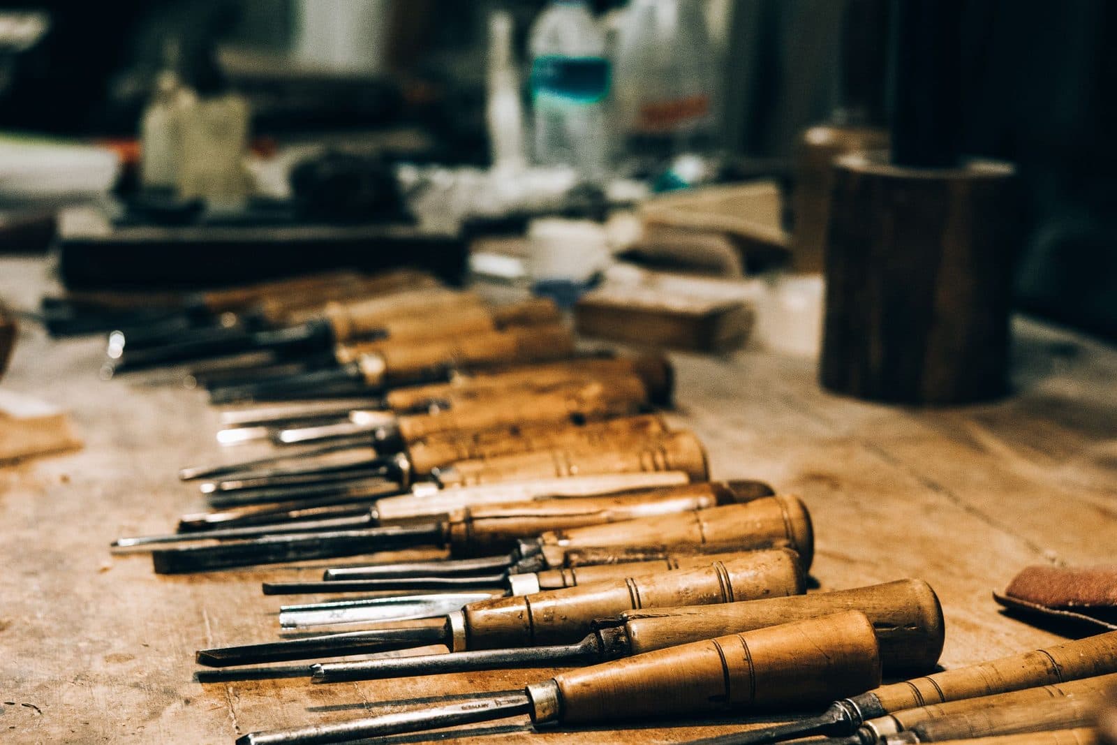 Gouges lined up on a workbench