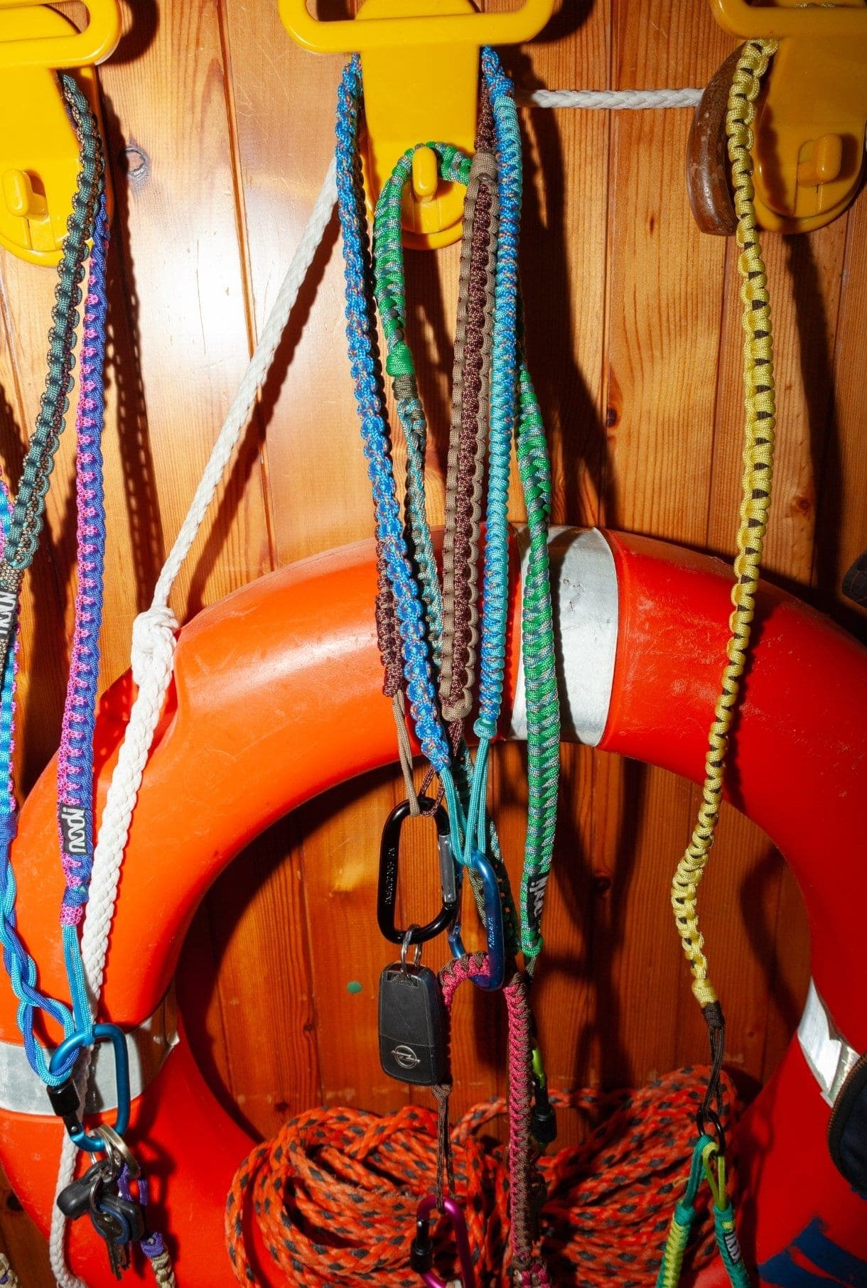 Close-up of a hand-woven piece made from colourful cords